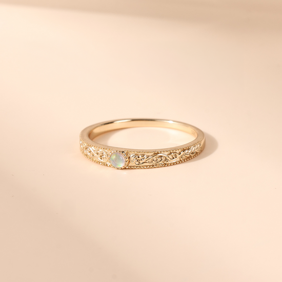 Intricately engraved 14k gold plated filigree band with a center iridescent opal, vintage-inspired scrollwork wedding or stacking ring by LIRAE.