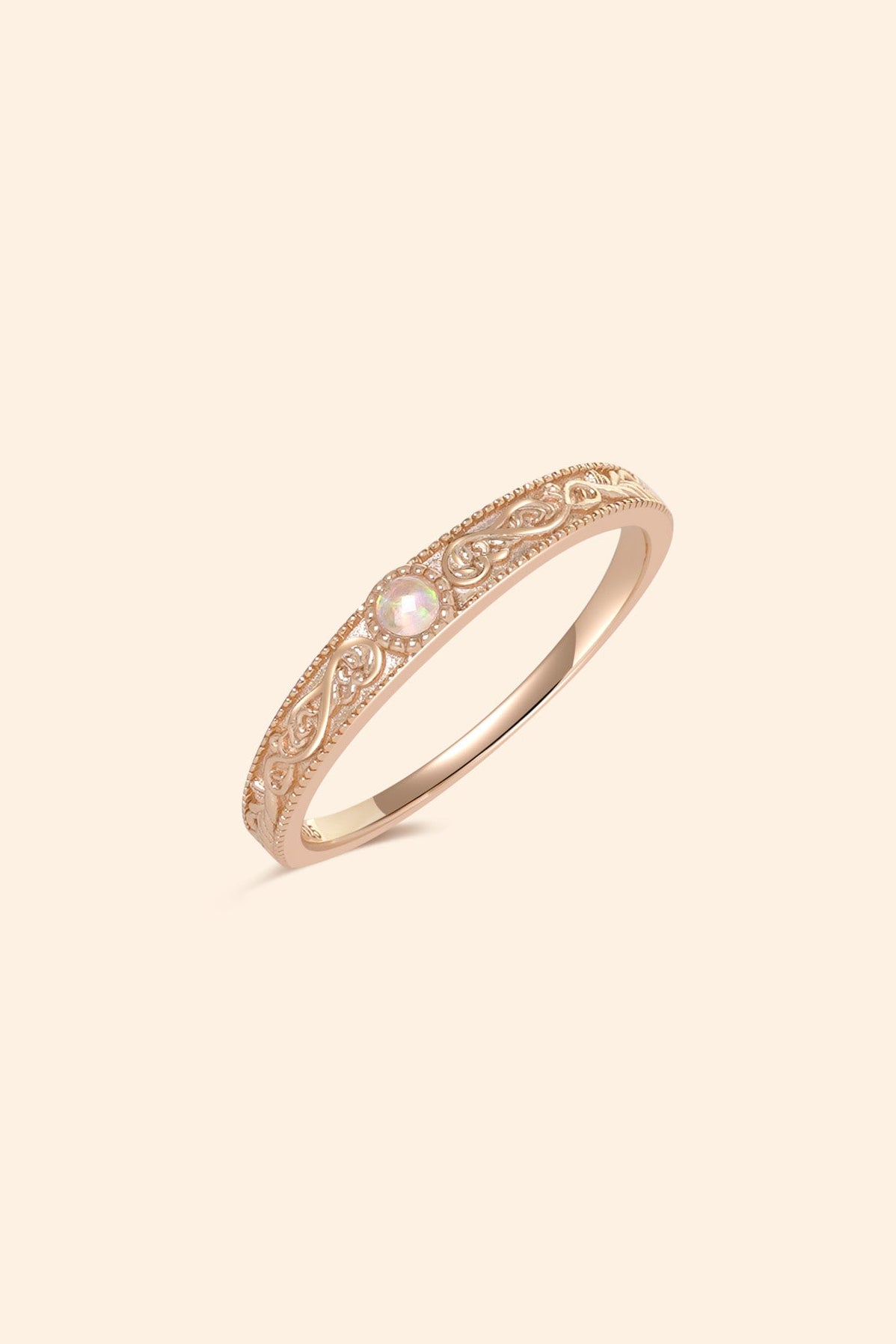 Intricately engraved 14k gold plated filigree band with a center iridescent opal, vintage-inspired scrollwork wedding or stacking ring by LIRAE.