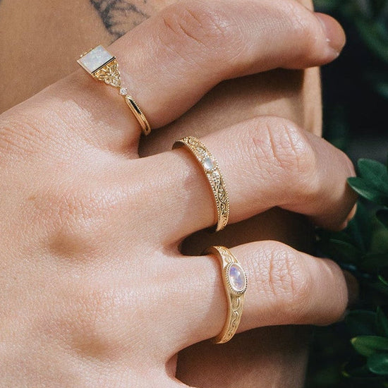 Intricately engraved 14k gold plated filigree band with a center iridescent opal, vintage-inspired scrollwork wedding or stacking ring by LIRAE.