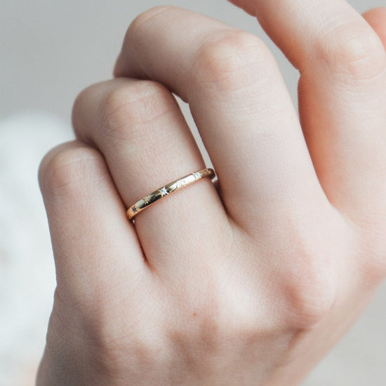 Ring with starburst engravings, celestial jewelry by LIRAE.