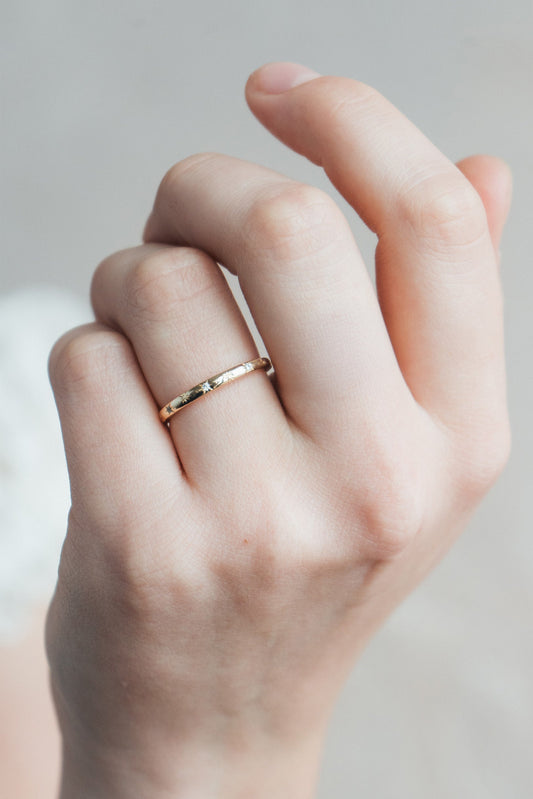 Ring with starburst engravings, celestial jewelry by LIRAE.