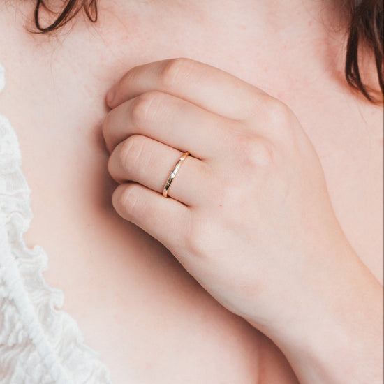 Ring with starburst engravings, celestial jewelry by LIRAE.