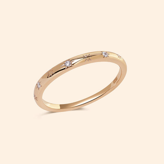 Ring with starburst engravings, celestial jewelry by LIRAE.