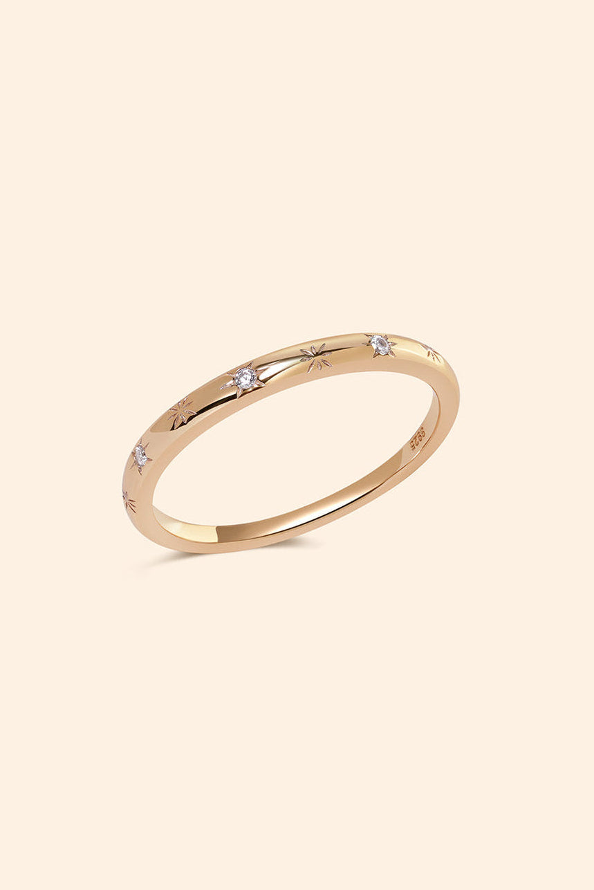 Ring with starburst engravings, celestial jewelry by LIRAE.
