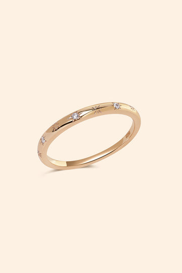 Ring with starburst engravings, celestial jewelry by LIRAE.